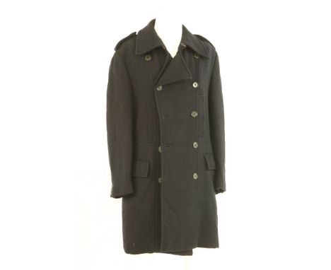 A Gucci gentlemen's navy blue coat,with synthetic fur lining, double-breasted with button front
