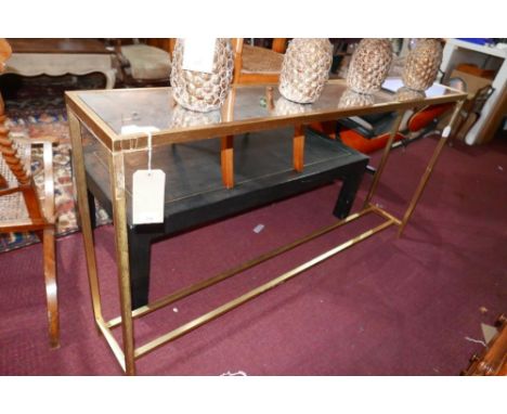 A contemporary gilt console table with mirrored top, H.80 W.152 D.26cm 