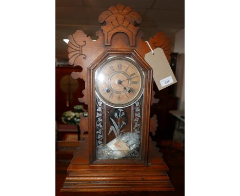 An early 20th century American oak cased mantel clock, by Ansonia Clock Company, USA, eight day Belmont strike, gingerbread s