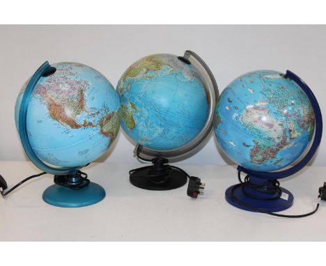 Three vintage light up globe lamps 