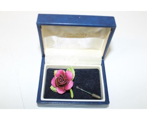 A boxed Coalport ceramic brooch 