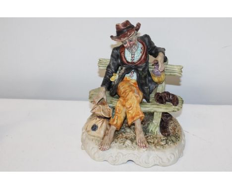 A vintage Capodimonte figurine 23cm tall 