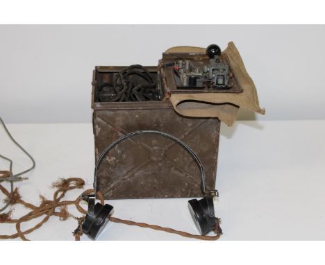 A Military Morse key &amp; signal light in metal box with headphones 