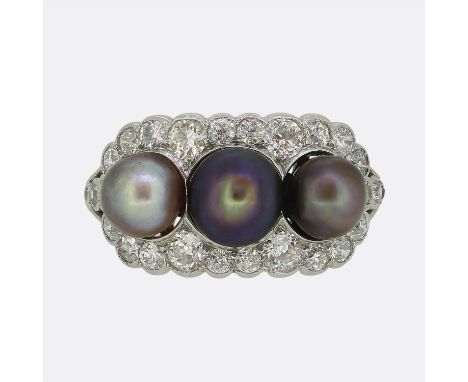 Edwardian Three-Stone Natural Pearl and Diamond Ring.       Weight:Â&nbsp;5.6 grams Ring Size:Â&nbsp;K (50) Band Width:Â&nbsp