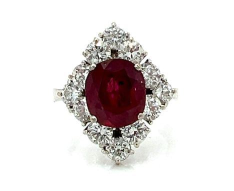 18K White Gold 2.60 Ct. Ruby &amp; Diamond Ring.                        Weighing 6.4 grams Set with an app. 2.60 Ct. Ruby Alo
