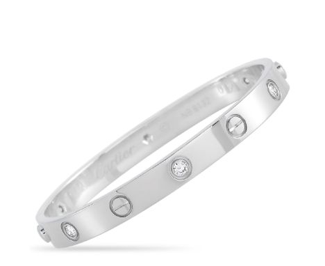 This LOVE bracelet is a classic Cartier offering. The bangle is made with 18K white gold and features the iconic Cartier scre