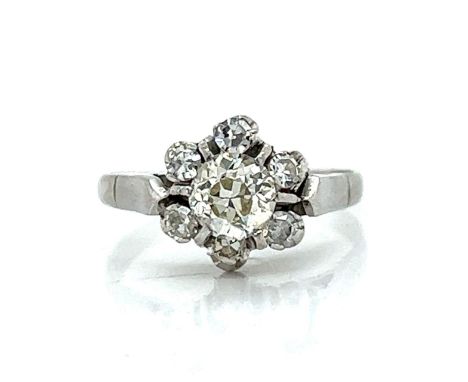 Art Deco Platinum 0.65 Ct. Diamond Ring.                         Weighing 4.4 grams Set with an app. 0.65 Ct. Diamond in Cent