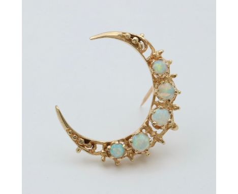 Mid Century Opal and 14K Gold Crescent Pin.            Metal: 14K Yellow GoldÂ  Weight: 4.3 grams Measurements: 1.1â€ long by