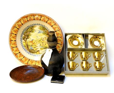A 20th century Italian Maiolica charger, together with an Indian double gourd water pitcher, two lacquered pots, a burr wood 