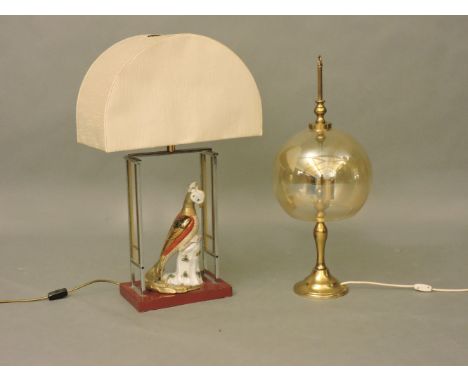 A retro table lamp mounted with a porcelain parrot, and one other with globular shade
