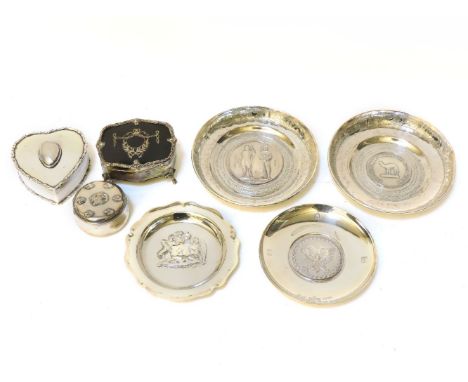 A small quantity of silver items, to include two dishes, inset with coins, a small silver heart shaped trinket box, with moth