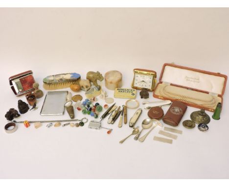 A box of miscellaneous items, including Mauchline ware, old marbles, silver plates and enamel ware