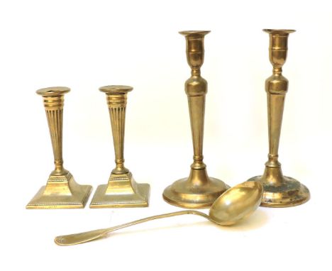 A pair of 19th century 'patent' neo-classical candlesticks, together with a pair of William Harrison 'patent' candlesticks, a