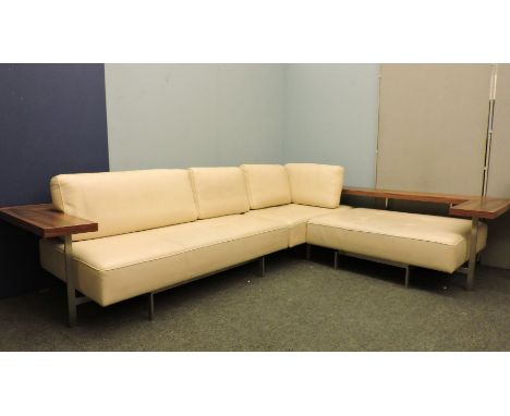 A large cream leather upholstered modernist corner settee, by Rolf Benz, with walnut shelf