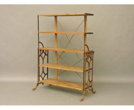 A metamorphic iron framed book shelf/table, 97cm wide