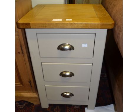 A modern light oak topped grey painted three drawer bedside cabinet, 60cm high x 40cm wide x 35cm deep  