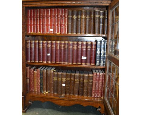 Three shelves of decorative vintage books