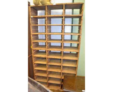 A large bank of vintage pigeon holes