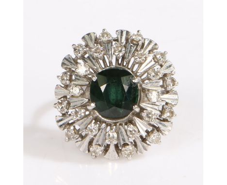 An 18ct white gold green sapphire and diamond ring.Total approx. sapphire carat weight: 1.75cts.Total approx. diamond carat w