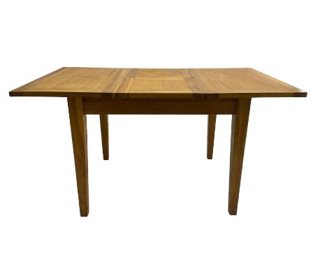 Light oak extending dining table, pull-out action with fold-out leaf, on square tapering supportsDimensions: Height:&nbsp;77c