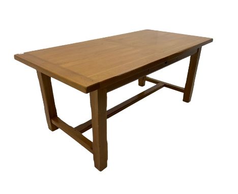 Light oak rectangular dining table with two additional leaves, square supports joined by floor stretcherDimensions: Height:&n