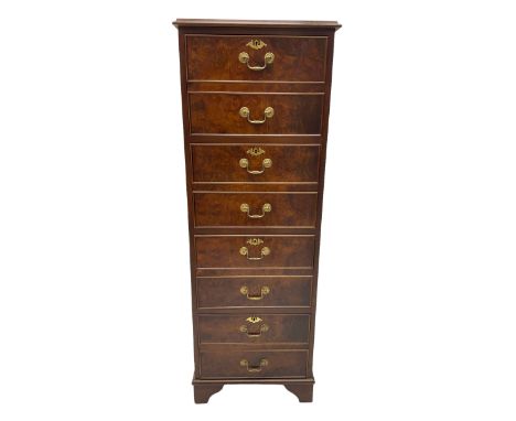 Figured walnut filing cabinet, the moulded top with leather inset, fitted with four drawers, on bracket feetDimensions: Heigh