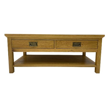 Light oak coffee table fitted with two drawers and undertier Dimensions: Height:&nbsp;45cm&nbsp; Length/Width:&nbsp;107cm&nbs