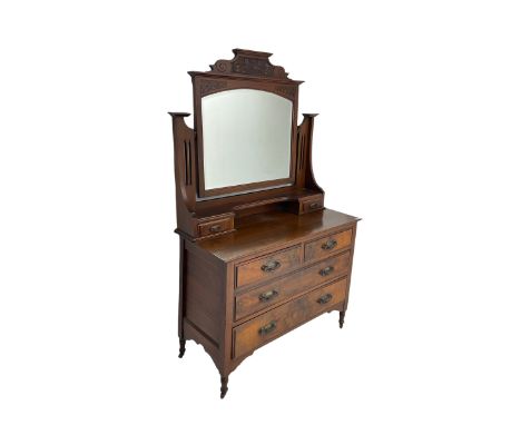 Edwardian walnut Art Nouveau period dressing chest, swing mirror with tulip carved pediment over two short and two long drawe