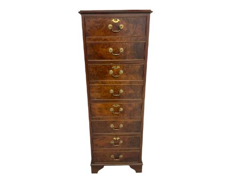 Figured walnut filing cabinet, the moulded top with leather inset, fitted with four drawers, on bracket feetDimensions: Heigh