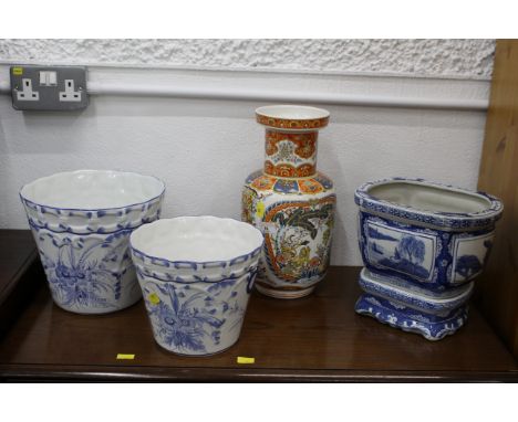 Two blue and white Portuguese floral patterned planters, an oriental blue and orange vase and an oriental blue and white plan