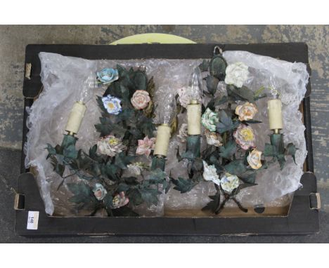 Two floral encrusted wall light fittings