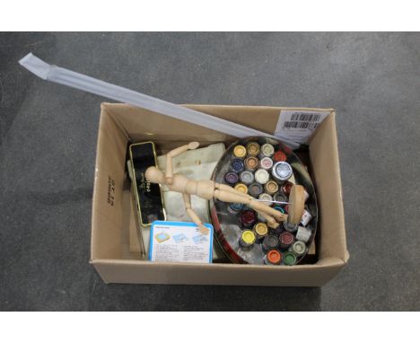 Box of paints, artists tools and artists mannequin