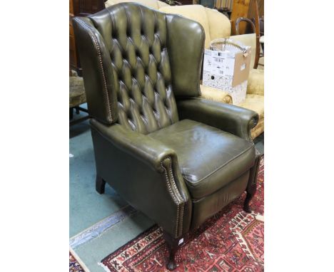 A green leather button back reclining chair Condition Report: Available upon request