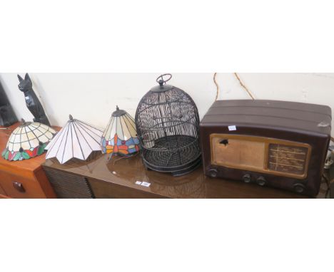 Three Tiffany style ceiling lights, Another ceiling light, A Cossor bakelite radio and a small modern bird cage (6) Condition