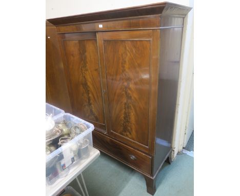 A Victorian mahogany wardrobe with two doors over full width drawer on bracket feet, 180cm high x 134cm wide x 61cm deep Cond