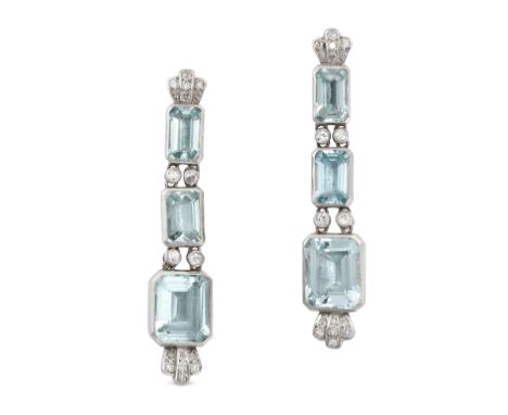 A PAIR OF AQUAMARINE AND DIAMOND DROP EARRINGS in 18ct white gold, each set with three octagonal step cut aquamarines, accent