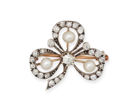 AN ANTIQUE PEARL AND DIAMOND CLOVER BROOCH in yellow gold and silver, designed as a clover set with three pearls, accented by