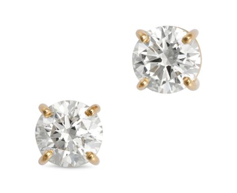 A PAIR OF DIAMOND STUD EARRINGS in 18ct yellow gold, each set with a round brilliant cut diamond, the diamonds both totalling