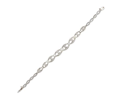 A PEARL AND DIAMOND BRACELET in white gold, set with three graduated pearls over open-work links, set throughout with round b