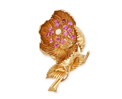 A VINTAGE RUBY AND DIAMOND FLOWER BROOCH in 18ct yellow gold, designed as an articulated flower, set to the centre with a rou