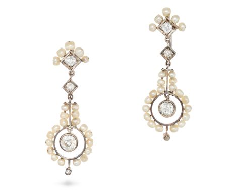 A PAIR OF ANTIQUE DIAMOND AND SEED PEARL DROP EARRINGS each set with an old cut diamond in a frame of pearls, suspending an o