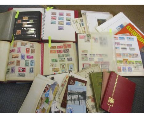 A quantity of Worldwide and Commonwealth stamps in albums ad stock books together with First Day covers and loose stamps 
