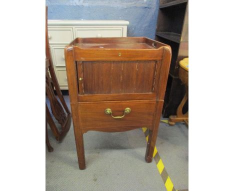 A Georgian mahogany commode with gallery top above tambour door and pull out commode, 79 h x 51 w x 46cmd 