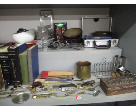 A selection of kitchenalia to include a wooden handled corkscrew, and books to include a leather bound Holy Bible printed by 