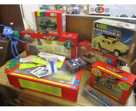 Late 20th century boxed Britains toy model vehicles and other toys to include a Bugs Life talking Ant model, collectors tea c