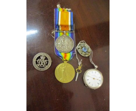 First World War Victory medal and a 1914-1918 British War medal, both marked '7791 PTE G.W. Higgins Herts R' together with th