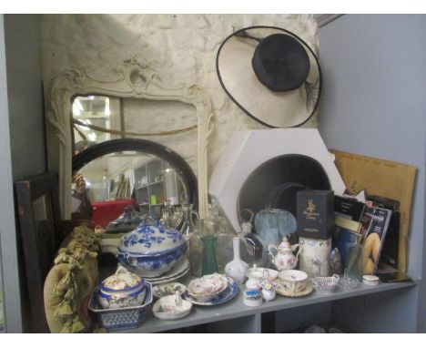 A large mixed lot comprising hats, tights, books, mirrors, ceramics, glass, vintage empty glass perfume bottles, a print, a c