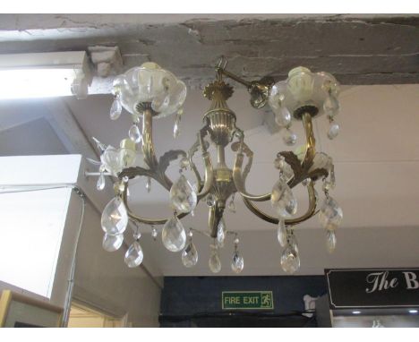 A vintage brass chandelier with glass droplets A/FLocation: SR 