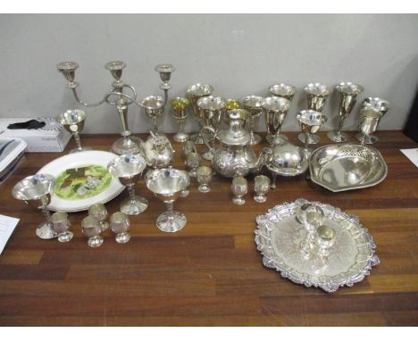 Silver plate to include goblets, a candelabra and other items Location: G 