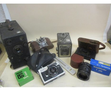 Vintage cameras to include a Bencini Koroll S A/F, a box Brownie Six-20 Model E, a Vest Pocket Kodak in a leather case, a Ric